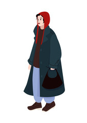 Woman in oversized dark coat and red hood carrying black handbag dressed for cold weather in casual winter street style