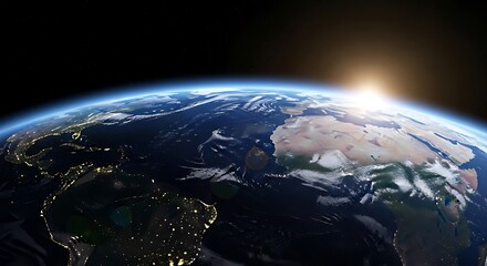 A vibrant photograph presents Earth from space, revealing a stunning dawn with bright light casting over continents