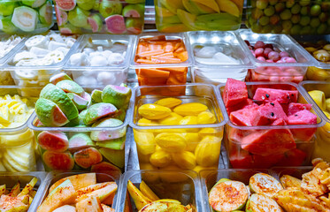 Fresh fruits sold on the street stand in Yangshuo, China
