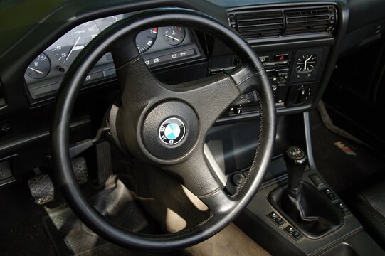 BMW E30 M3 interior with dashboard and steering wheel