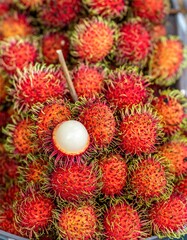 Rambutan Fruit Pile - A Tropical Delight with Unique Spiky Exterior.