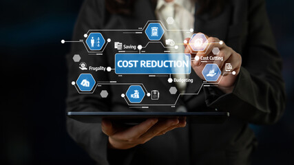 Business professional holds a tablet displaying a futuristic interface focused on cost reduction and budgeting, emphasizing data-driven financial strategies and opportunities. Tessel