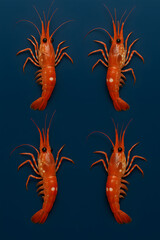 four Spot prawn on Blue Background	
