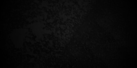 Distressed rough black cracked wall slate texture wall grunge backdrop smoke background. Stone concrete texture anthracite panorama. Old vintage charcoal night dark black stucco design.	