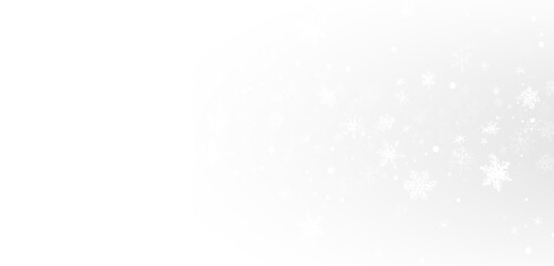 Realistic falling snow with white flakes in the air. Snowy texture on transparent background for creating winter mood, overlays, or festive effects.
