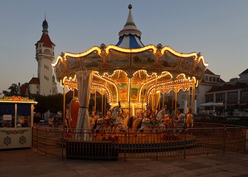 Evening ride on old fashion carousel