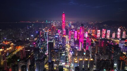 Aerial Night View of Shenzhen City Skyline with Colorful Lights and Modern Skyscrapers, China - Powered by Adobe