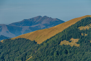 Scenic view of the mountains surrounding Como lake from Monte di Tremezzo on a sunny summer day