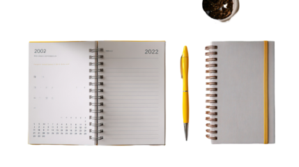 Flat lay of 2026 desk calendar, pen, and festive decorations on transparent background
