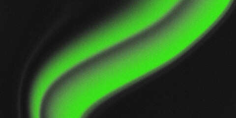 Close up view of glowing green aurora borealis light streaks in a dark sky abstract background