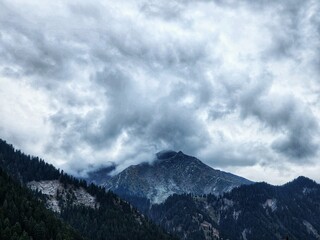 Mountains Wrapped in Clouds