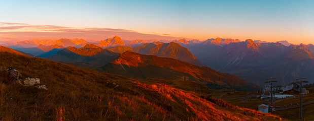 High resolution stitched panorama of an alpine sunset or sundowner at Mount Diedamskopf, Schoppernau, Bregenz, Vorarlberg, Austria