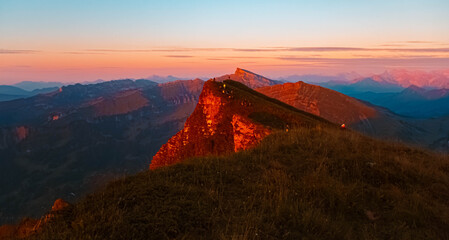 Alpine sunset or sundowner with amazing geological layers in rock formations and Mount Hoher Ifen...