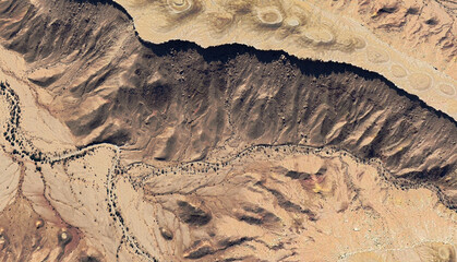 Aerial view of a dried-up riverbed in the desert of Saudi Arabia August 2025