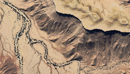Aerial view of a dried-up riverbed in the desert of Saudi Arabia August 2025