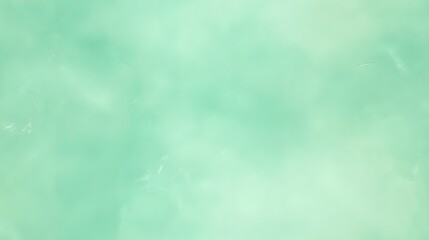 Soft, diffused texture displays an ethereal, pale mint green color palette.