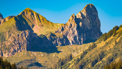 Alpine summer view with mountain peak details seen from Schoppernau, Bregenz, Vorarlberg, Austria