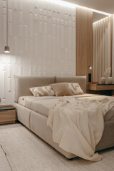Bedroom with a bed, bedside table and lamps