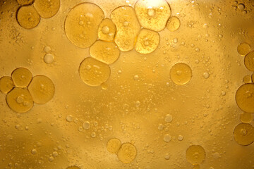 Bubbles and Circles Create Golden Abstract Background Texture