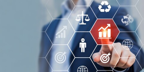Business Strategy and Growth: A professional in a modern business suit focuses on digital icons representing strategic goals and growth metrics, symbolizing success in the corporate sphere. 