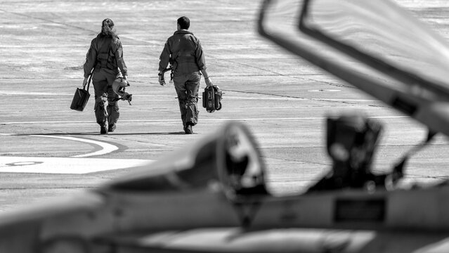fighter pilots walking after mission