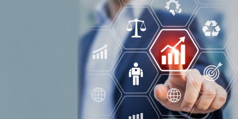 Digital Business Touch: An individual's index finger makes contact with a glowing interface of business icons, in a visual metaphor for progress and business