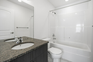 Bathroom with a white toilet and sink