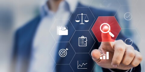 Business analysis and Technology: A close-up shot of a person using modern touch screen technology with an array of business icons surrounding them representing analytics, data and business process.