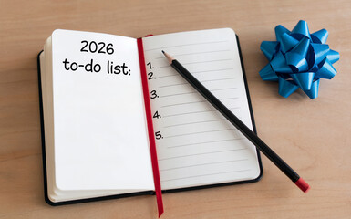 Planning New Year 2026 Goals with a To-Do List in a Notebook