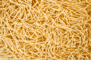 Thin vermicelli noodles on white background with text space. Great for Italian cuisine, recipe designs, and product advertising. 