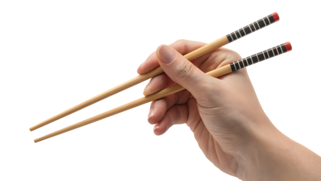 Person's hand holding pair of chopsticks . Isolated on transparent background, png