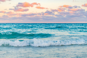 Dramatic sunrise horizon at sea. Romantic summer vacation on sunset seascape. Sea sunset on ocean. Sunset seascape at summer vacation. Sunrise with sea beach. Sea waves