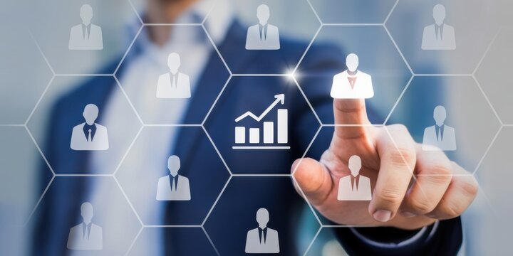 Future of Business: A hand presses on a virtual screen. The image suggests human resources, focusing on the idea of staff performance and growth.