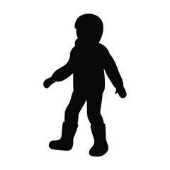 Full body silhouette of a small child wearing winter clothes and boots