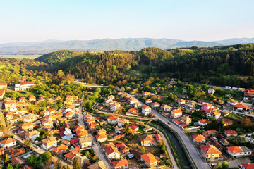 Aerial view of Kalofer town, Bulgaria, surrounded by green hills