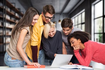 Group of high school smart students friends in bright library