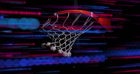 Showing basketball hoop rim and frayed net glowing in dark gym, with red-blue light streaks