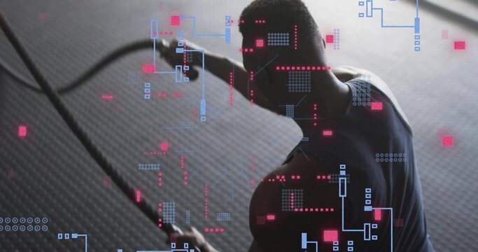 Swinging battle ropes athlete wearing workout clothes training in gym, with digital metrics overlay