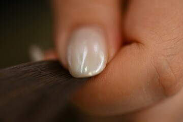 Nail Care Macro Female Hand with Fresh Nail Polish — Beauty and Self-Care Close-up of female hand with glossy nail polish. Ideal for beauty, cosmetics, and fashion content.
