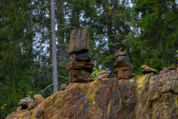 Rock garden - pyramids made of stones in the middle of the forest