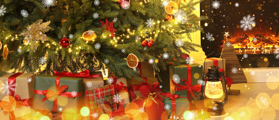 Gift boxes under Christmas tree with balls, flying snowflakes and bokeh lights on festive greeting...