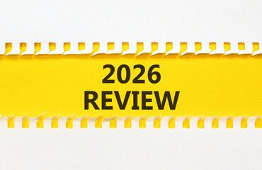 2026 Review symbol. Concept words 2026 Review on beautiful yellow paper. Beautiful white paper background. Business and 2026 review concept. Copy space.