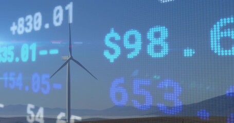 Solitary wind turbine rotating while ticker overlay fading and updating illustrating market shifts - Powered by Adobe