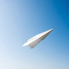 Fototapeta premium Simple White Paper Airplane Gliding Against a Gradient Blue Sky: A Symbol of Freedom, Dreams, and the Potential for Flight in Business, Education, and Personal Pursuits