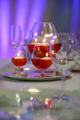 candles in a wine glass, table decor