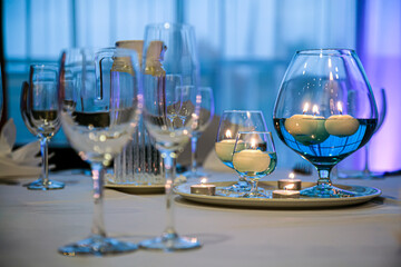 candles in a wine glass, table decor