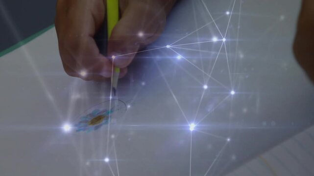 After touching paper yellow pencil tracing circle around emblem while network overlay pulsing