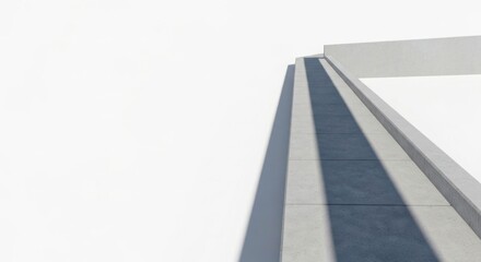 Geometric architectural detail with strong shadow and bright white space