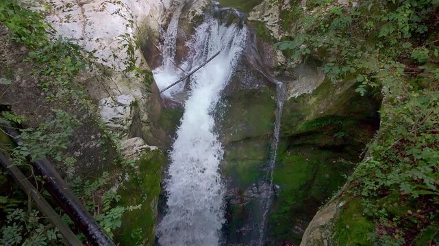 Waterfall of the Kozjak River coming down the mountain to join the Isonzo River, Slovenia.