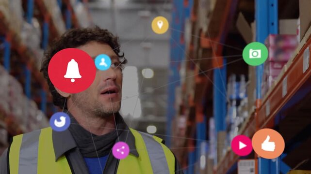 Warehouse worker monitoring floating icons spawned by pin icon for optimizing inventory logistics